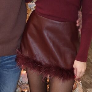 Mini skirt with feather trim